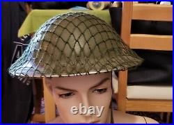 Canadian/British Helmet with netting & chin strap 1952 (Korean War Era)