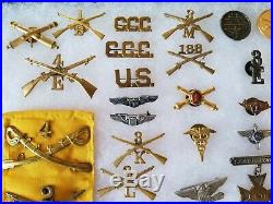 Military insignia lot, 1900 thru Korean war era