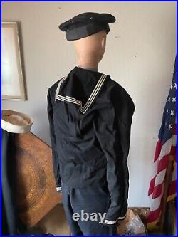 U. S Navy uniform Korean War. IDd. To the same Veteran. Full uniform and hats